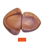 #دو مدل آموزشی لثه نرم (فک بیدندان) به رنگ صورتی، از نمای بالا و کنار هم قرار گرفته، ایدهآل برای آموزش ساخت دست دندان.